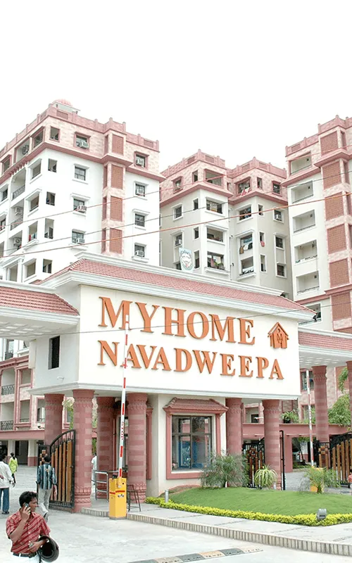The Navadweepa gateway, with the residential towers rising behind it